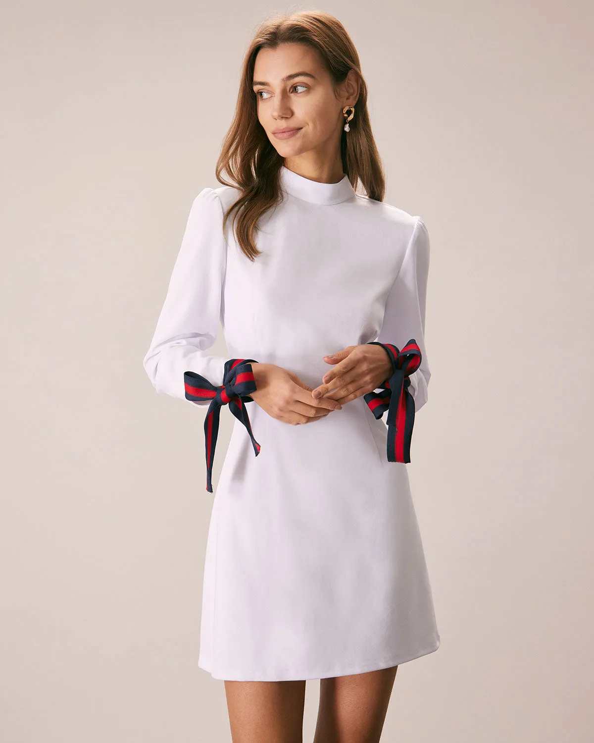 The White Mock Neck Bowknot Cuff Mini Dress